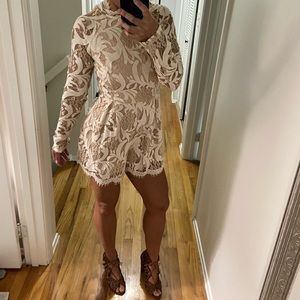 Nude lace romper. Lace up back.